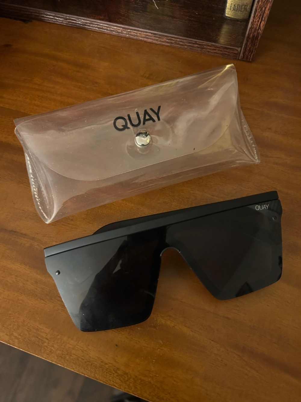 QUAY Black Shield Sunglasses with Clear Case
